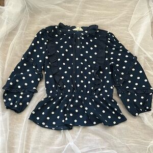 Navy and white polka dot shirt